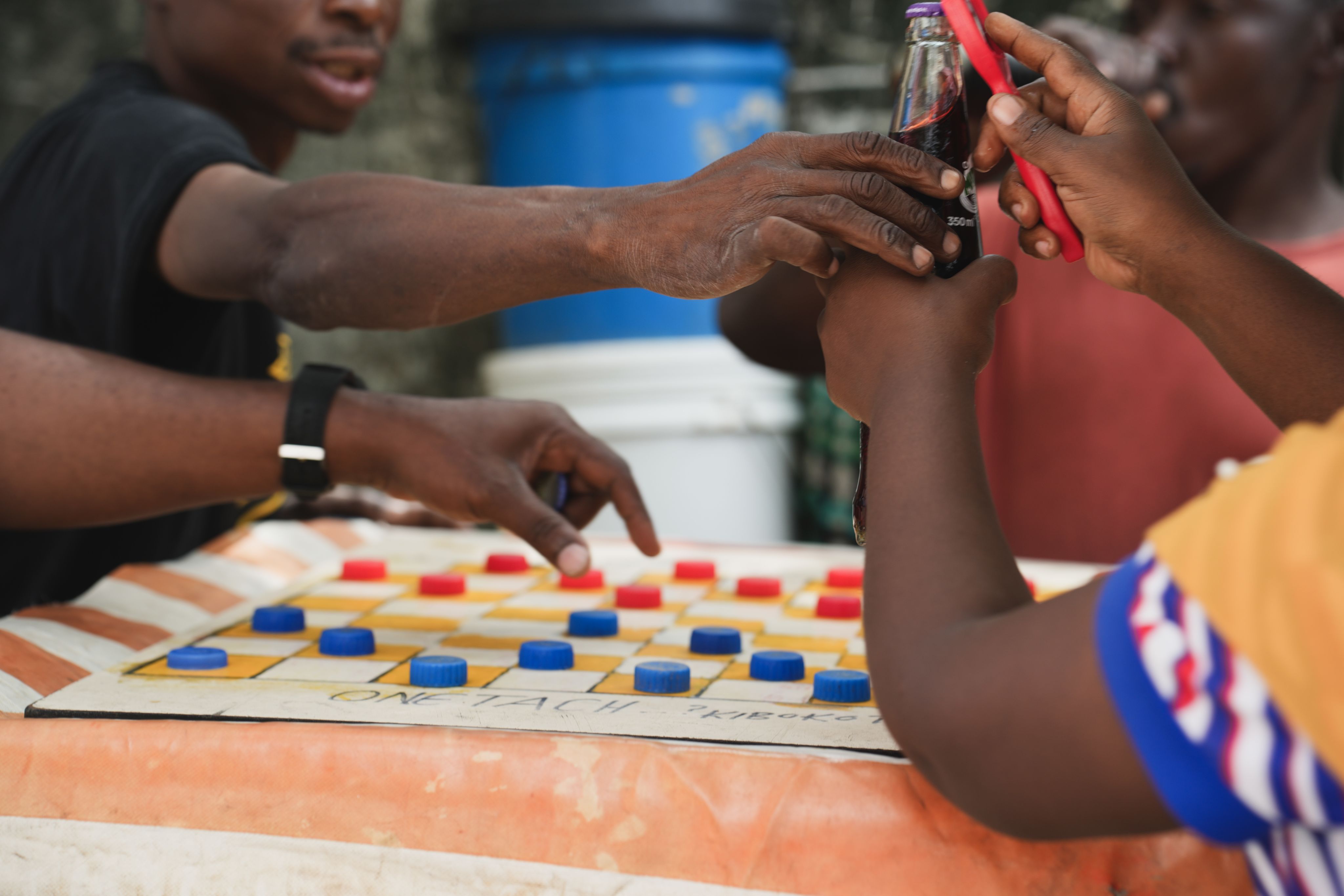 Soft drinks sold in Devotha Kutika's stall are popular amongst workers from the local port.