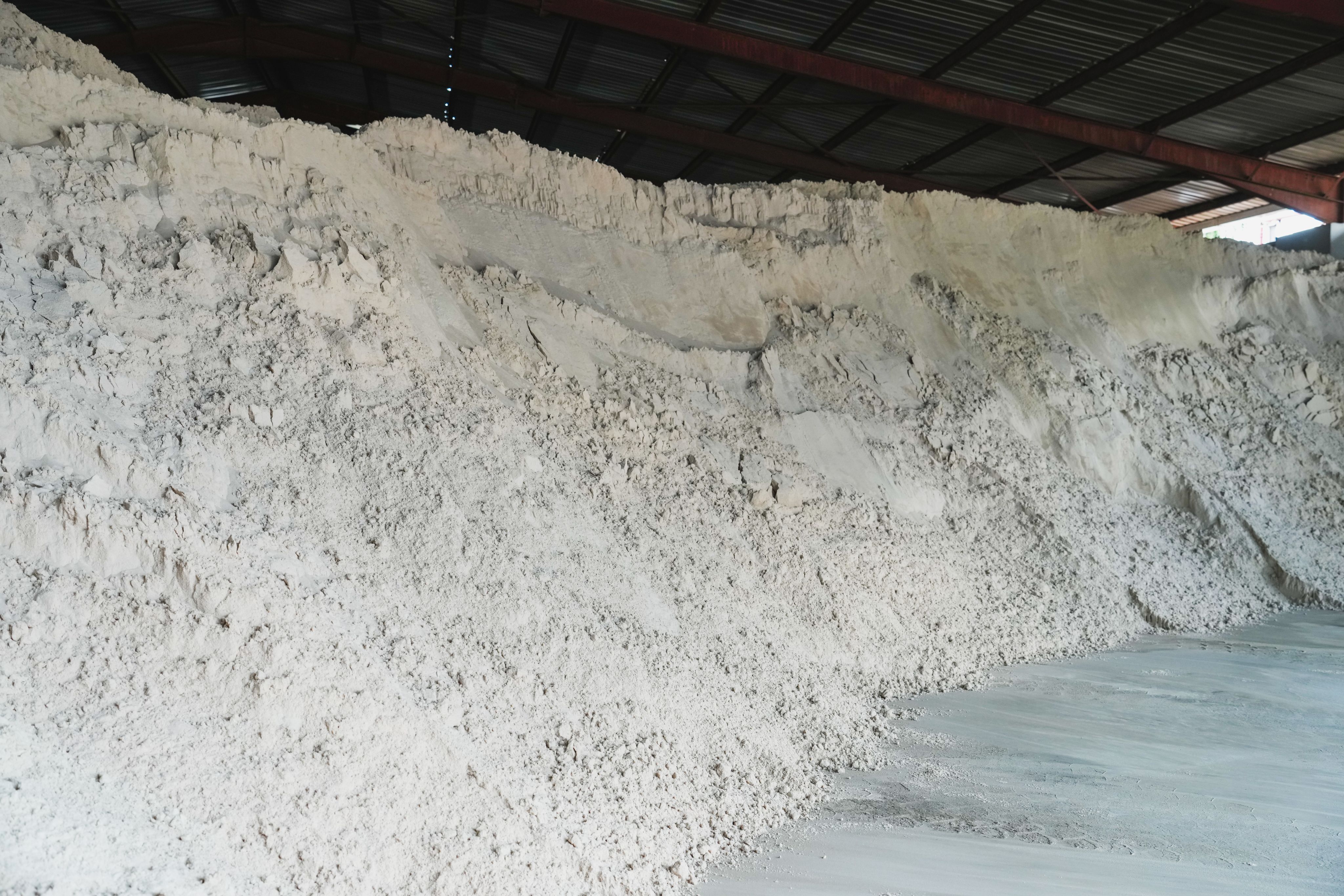 Sand (Silica) the main ingredient in glass production.