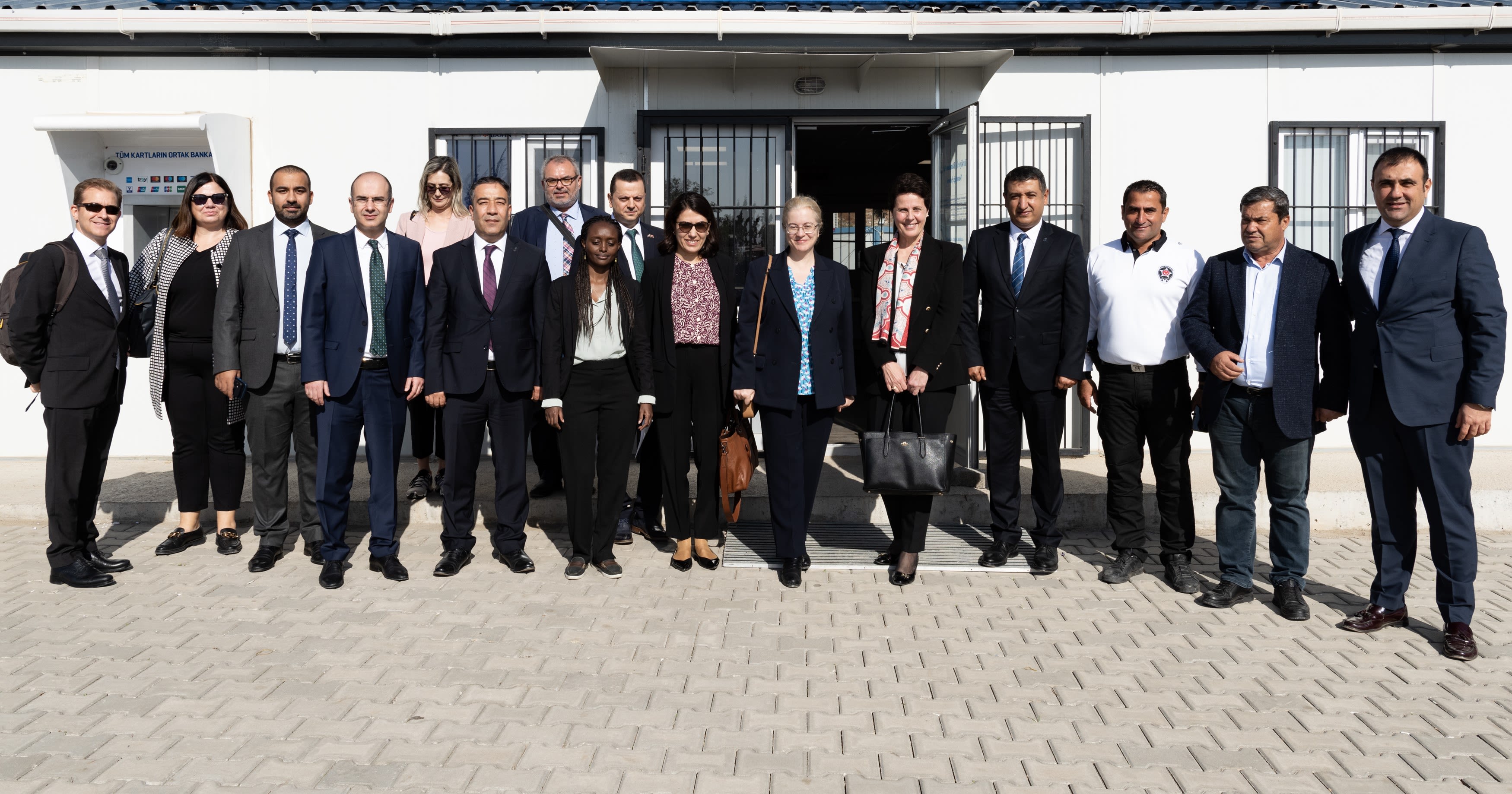 IFC Regional Vice President Hela Cheikhrouhou with representatives from one of the partner banks helping to channel money to small businesses