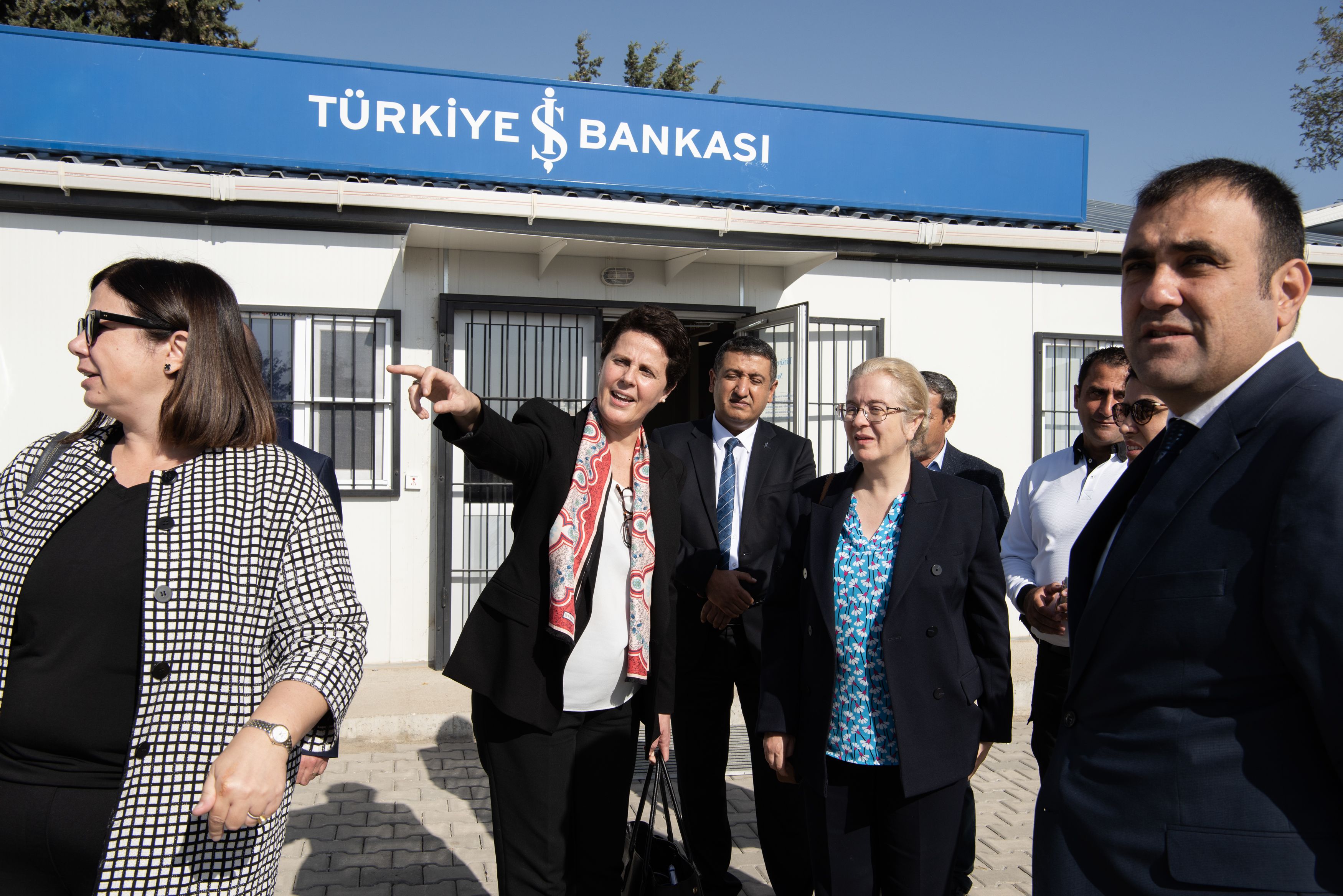 IFC Regional Vice President Hela Cheikhrouhou visits a temporary location of a partner bank