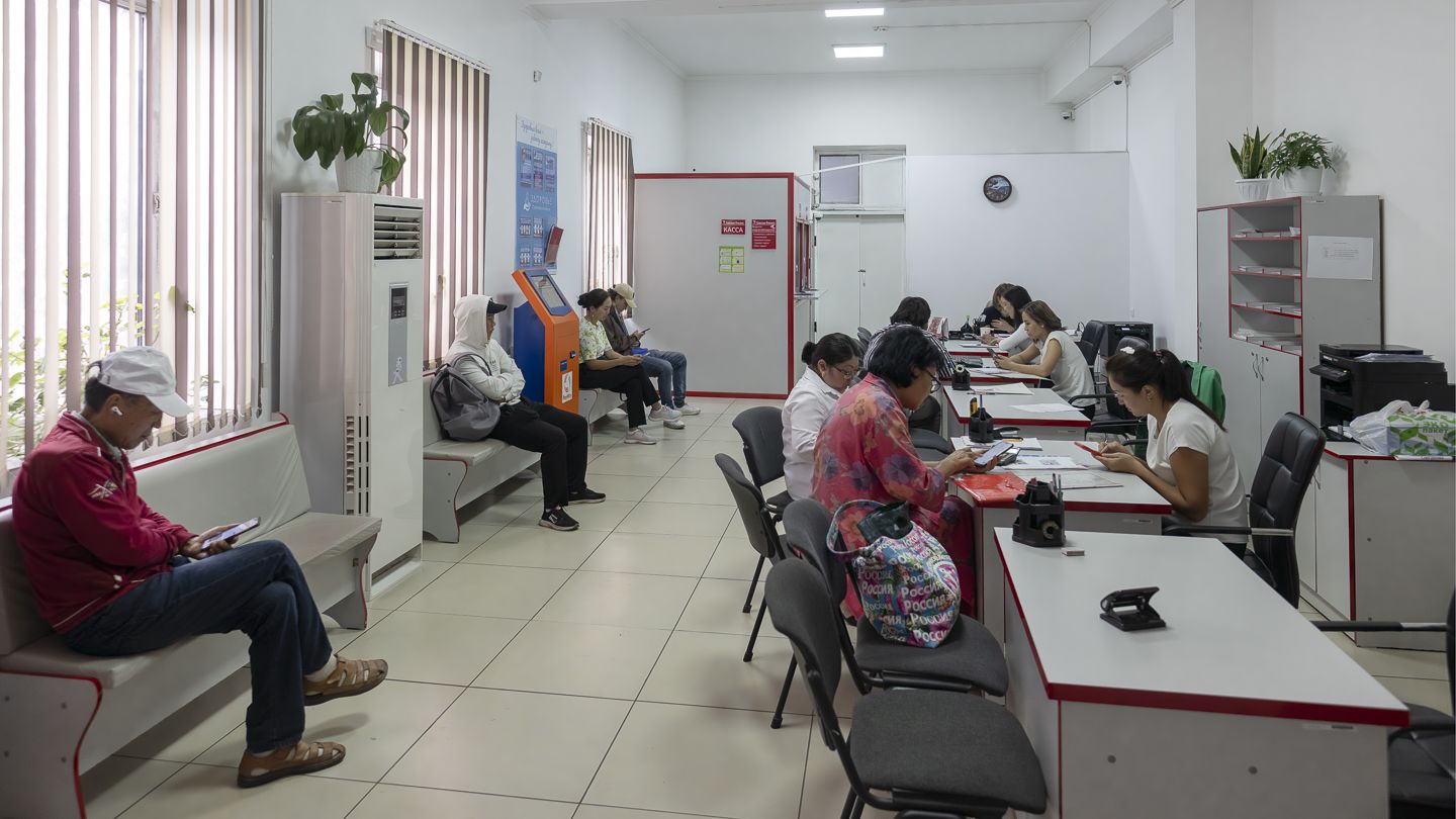 Customers inside Bailyk Finance's office. 